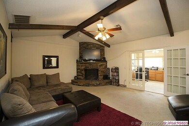 Spacious Great Room boasts vaulted and beamed ceil
