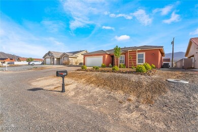 Single story home featuring fence, driveway, stucc