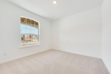 Empty room with carpet flooring