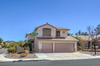 Mediterranean / spanish home with driveway, stucco