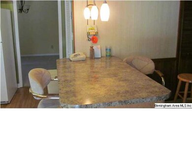 BREAKFAST BAR IN KITCHEN AREA. ALSO HAS A LARGE WA
