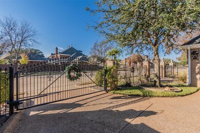Living room featuring a towering ceiling and light hardwood / wood-style flooring