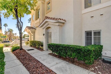 Doorway to property with stucco siding and a tiled roof