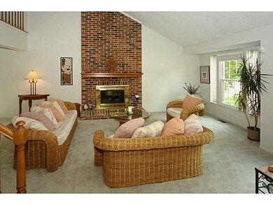 Living Room. This 1.5 story living room opens to the upstairs loft, making it feel very open.