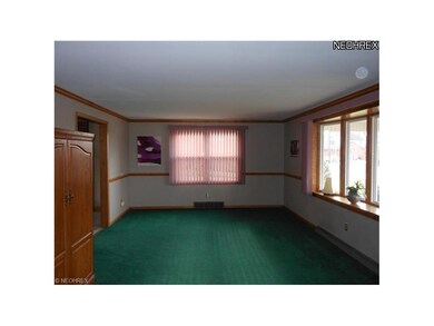 Large formal living room with nice bow window to v