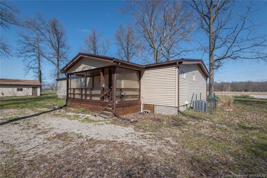 Rear view with covered back deck.