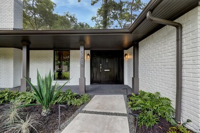 Fresh exterior paint and landscaping greets you.