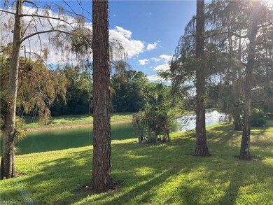 View of yard with a water view