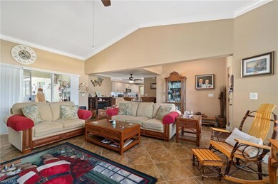 Tiled living room with high vaulted ceiling, ceili