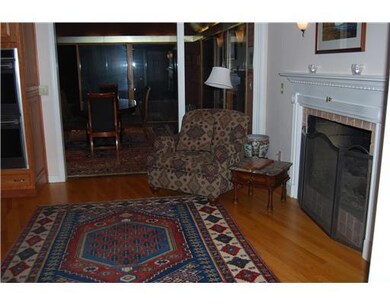 Other. Inviting fireplaced area off kitchen with d