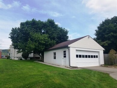 Spacious 2 car detached garage with opener, man do