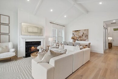 Great room with fireplace and vaulted ceiling