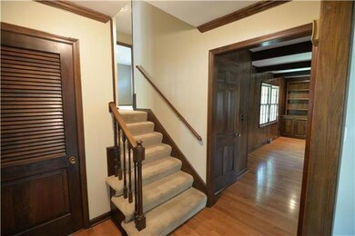 Foyer/entry has large coat closet and welcoming ha