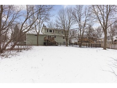 Expansive back yard with maintenance-free fenced i