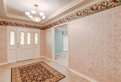 Large foyer with living room to the left as you en