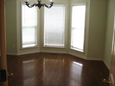 Dining room with plenty of natural light, a chande