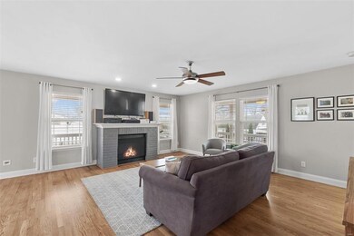 The family room has a cozy gas fireplace and lots 