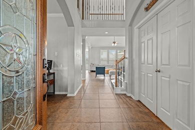 Welcome in.  Home office on your left, with a sitt
