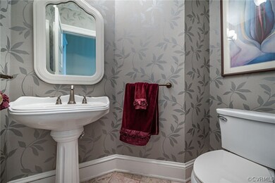 Bathroom featuring tile flooring and toilet