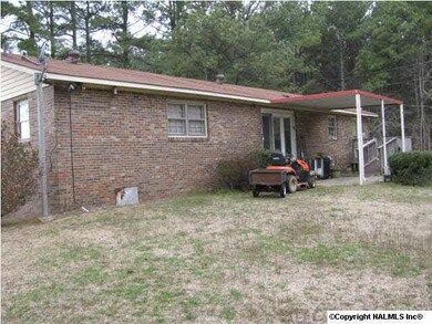 Rear of home showing patio.
