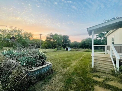 Yard at dusk with a yard