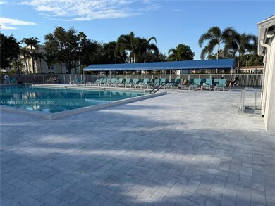 7290 Kinghurst Dr unit 306, Delray Beach, FL 33446 - photo 7