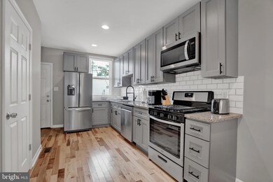 2111 E Chase St, Baltimore, MD 21213 - photo 7