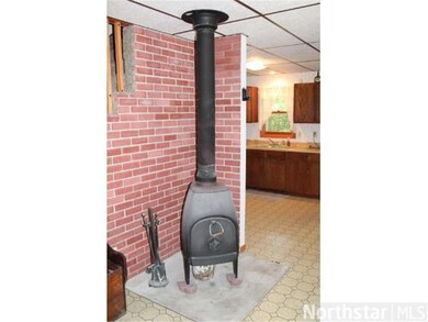 Free standing wood stove in Living room.