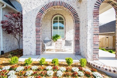 Beautiful brick-lined front porch.