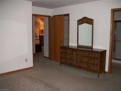Master bedroom with master bath with walk in showe