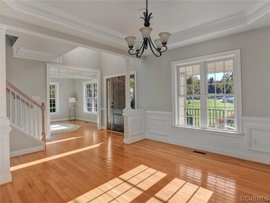 Dining Room is open to the foyer with large window