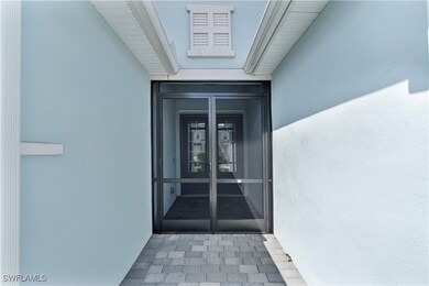 Property entrance with french doors
