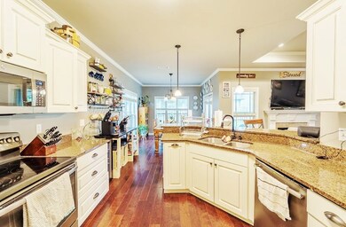 Kitchen open to dining and living