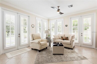 Living room with 2 sets of 8ft french doors and 2 