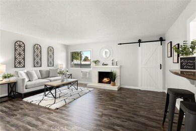 Spacious Living Room with Wood Burning Fireplace