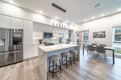 Kitchen with modern cabinets, stainless steel appl