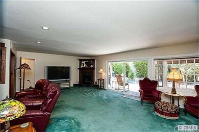 nviting Family room is open to the kitchen and has