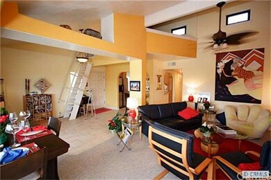 Another shot of the living area - note stairs to t