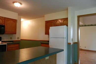 Kitchen. kitchen and hall to half bath off breezew