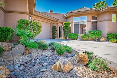 Doorway to property featuring concrete driveway, s