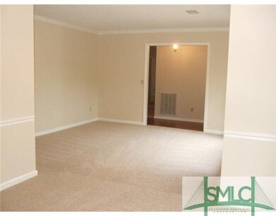 Living Room. Photo is taken from dining room.  Ope