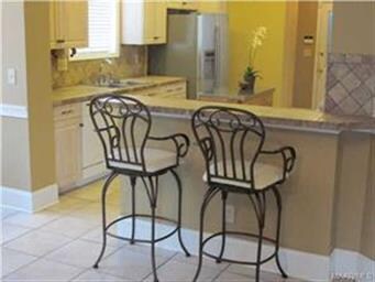 BREAKFAST BAR AREA OFF KITCHEN