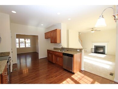 Kitchen and eat-in area are open to family room wi
