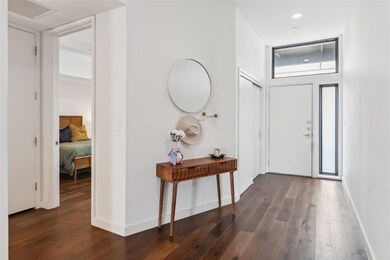 Entrance foyer featuring dark wood finished floor