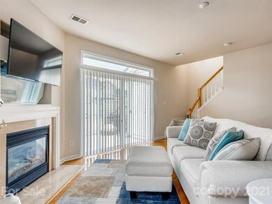 Living area features slider to outdoor patio and storage unit