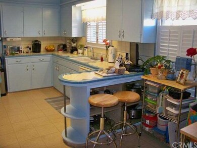 Kitchen with Old Style Tile and Small Breakfast Ba