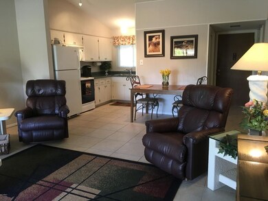 Living room looking to kitchen