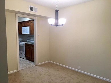 DIning area with new light fixture