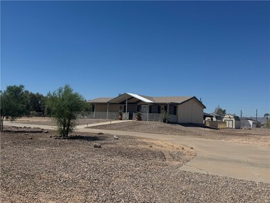 Ranch-style house featuring covered porch