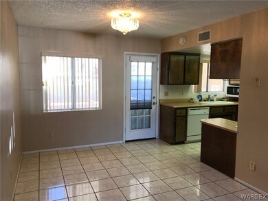 Casual Dining Area overlooking Backyard